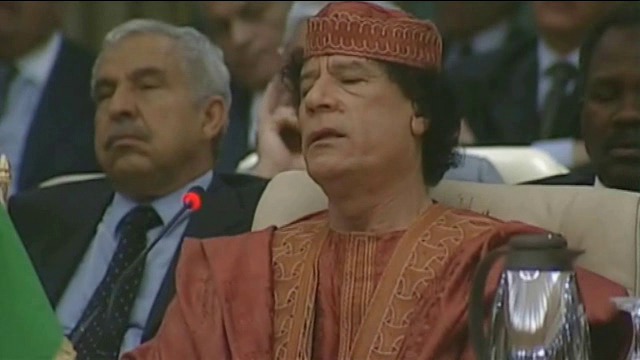 Qaddafi-Review
